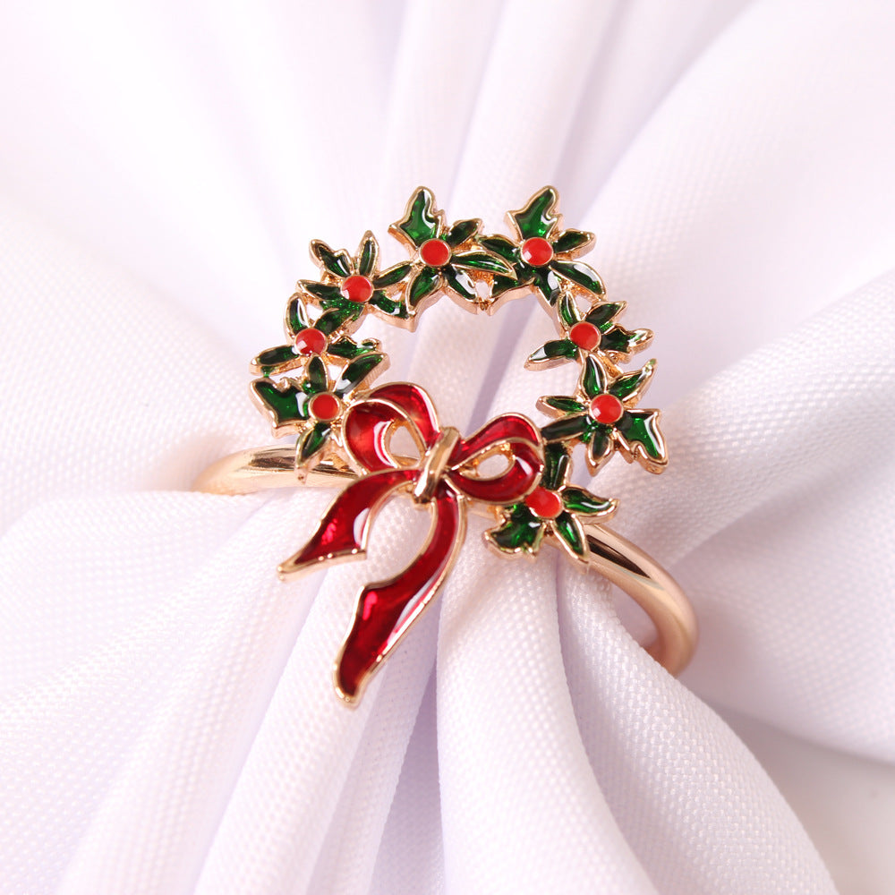 Gold-tone Christmas napkin rings with enamel details – view 7