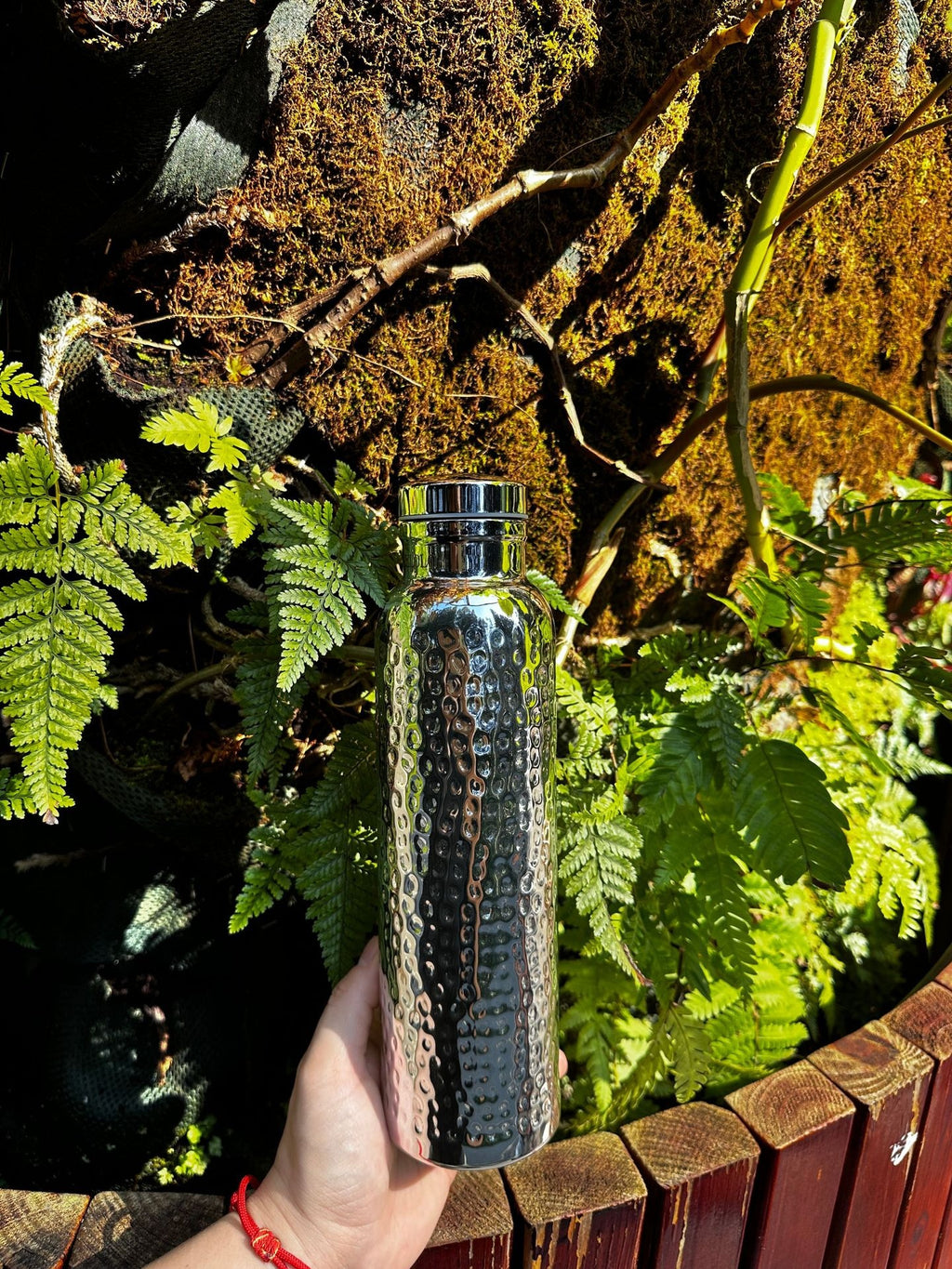 Hammered copper insulated water bottle with canvas bag