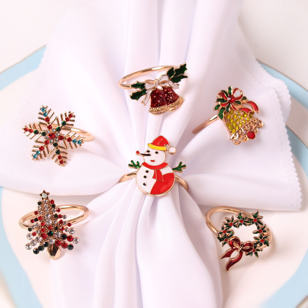 Gold-tone Christmas napkin rings with enamel details – view 1