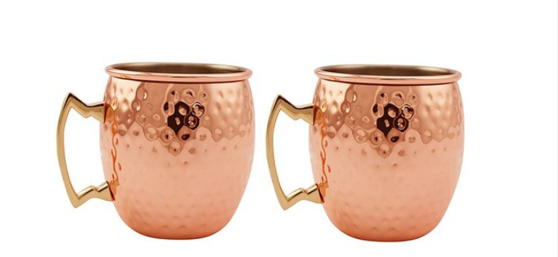 Set of 2 hammered copper mugs