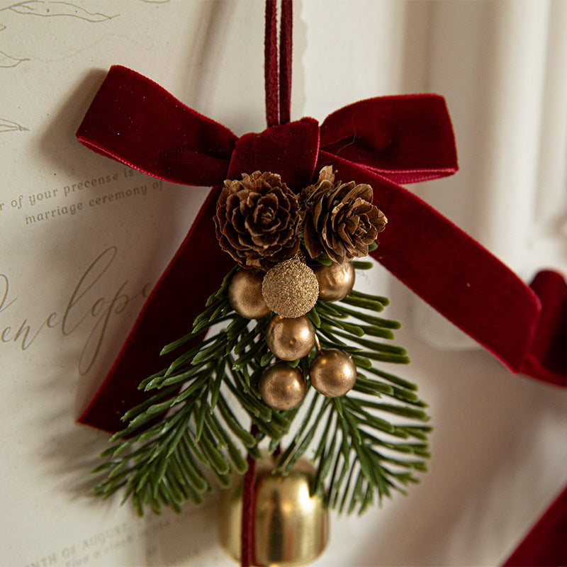 Burgundy velvet bow Christmas hanger with faux pine, pinecones and gold bells – view 5