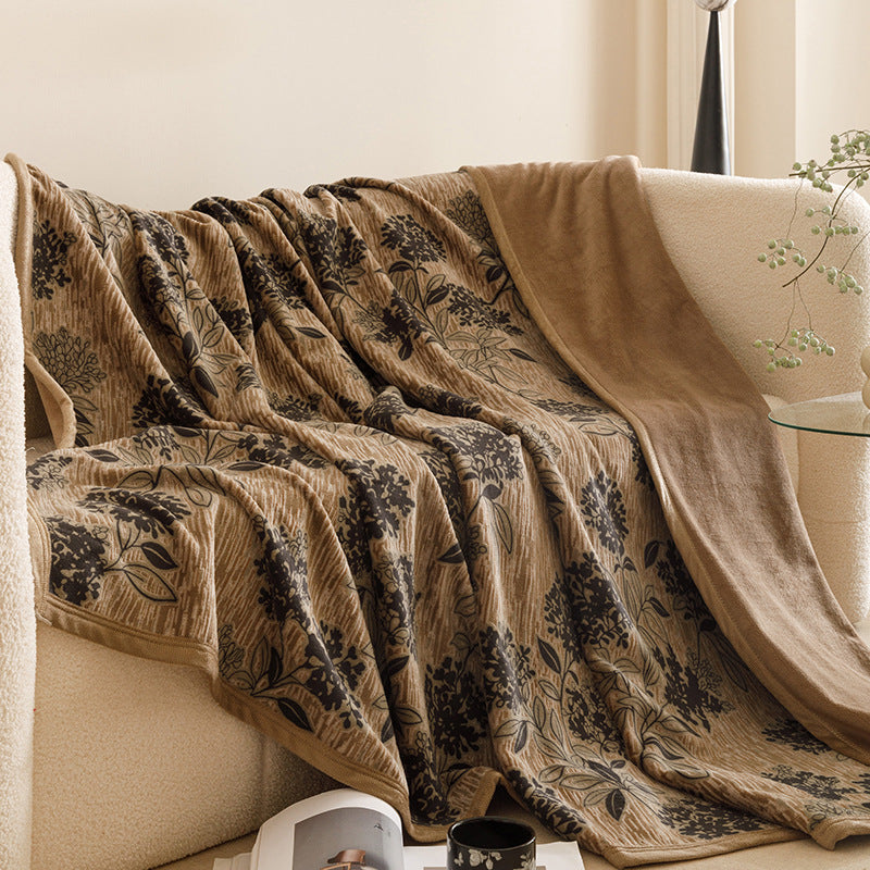 Botanical print plush throw blanket on a sofa – view 7