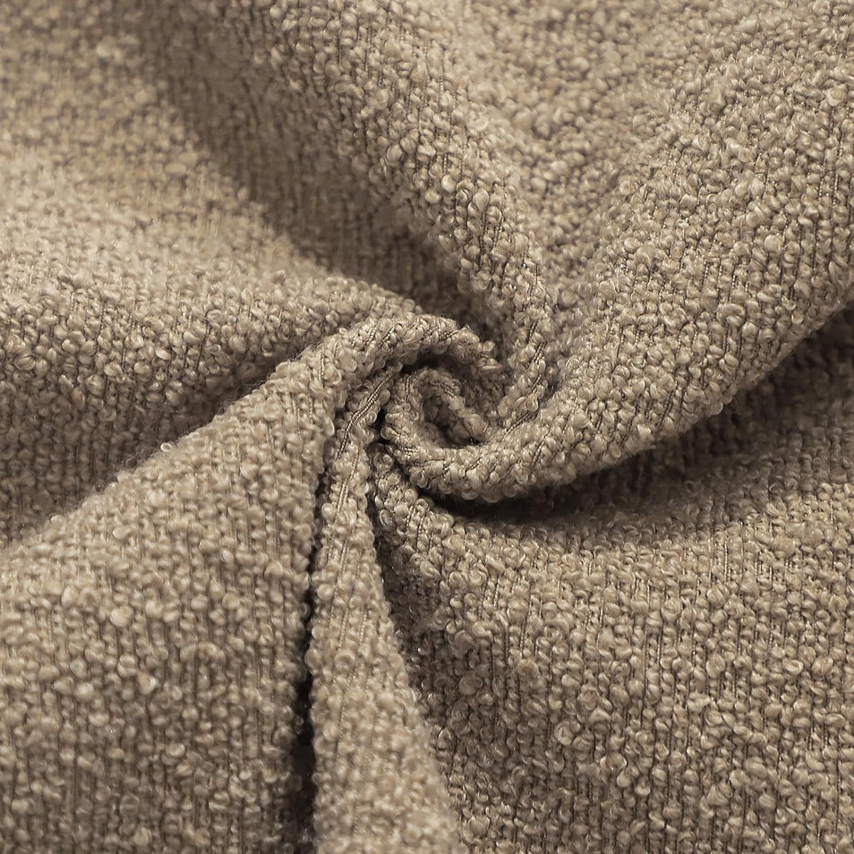 Bouclé pillow covers styled on a sofa