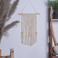 Macramé wall hanging with wood beads – view 1