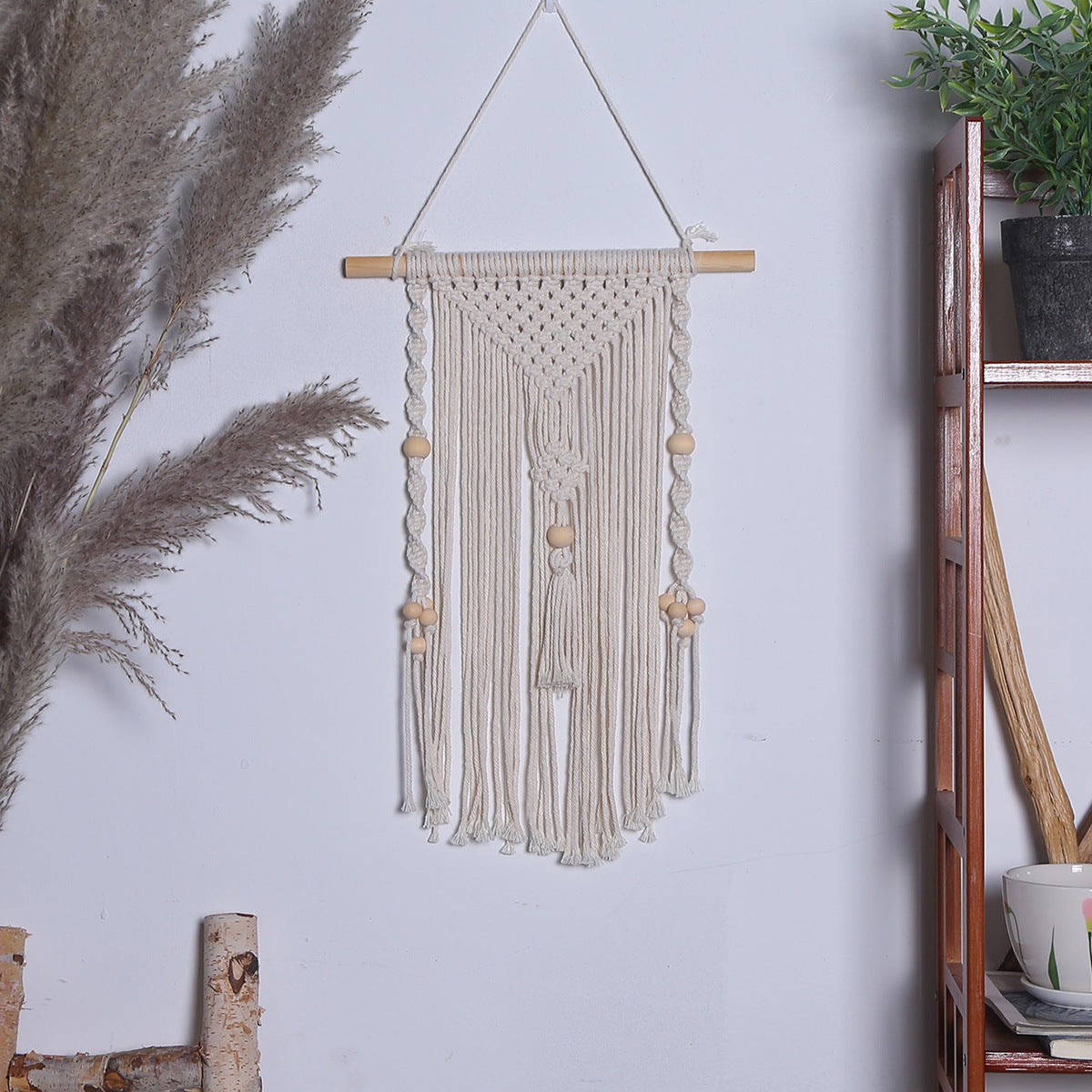Macramé wall hanging with wood beads – view 1