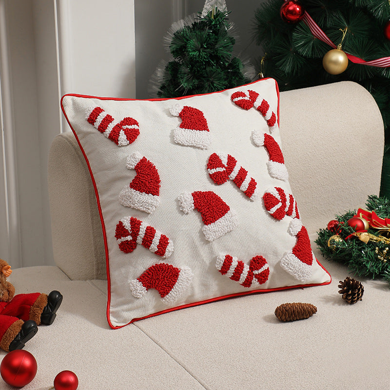Square tufted candy cane and Santa hat Christmas pillow