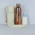 Hammered copper insulated water bottle with canvas bag