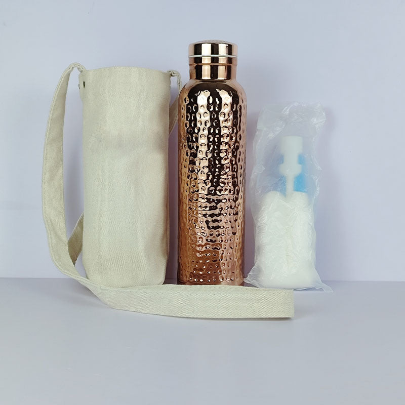 Hammered copper insulated water bottle with canvas bag