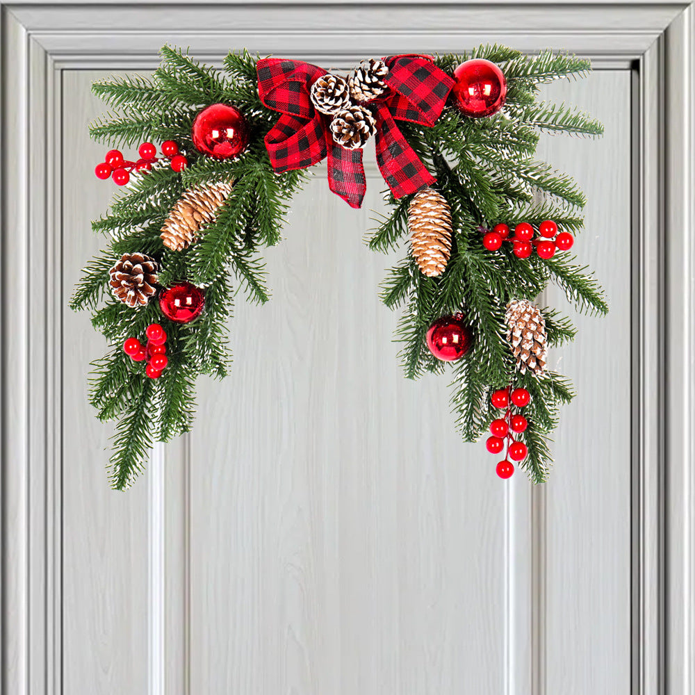 Faux pine Christmas door swag with a red and black buffalo check bow – view 1