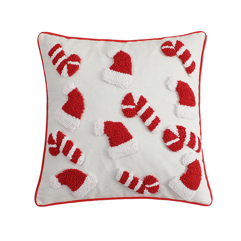 Square tufted candy cane Christmas pillow cover on white