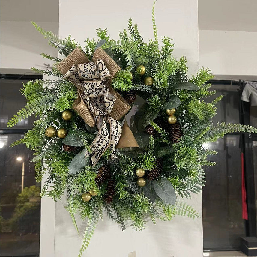 Pine and pinecone Christmas wreath with ribbon bow – view 1