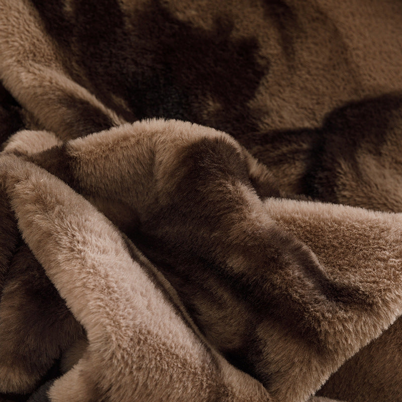 Botanical print plush throw blanket on a sofa – view 2