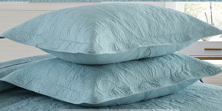 Quilted cotton pillow shams in aqua