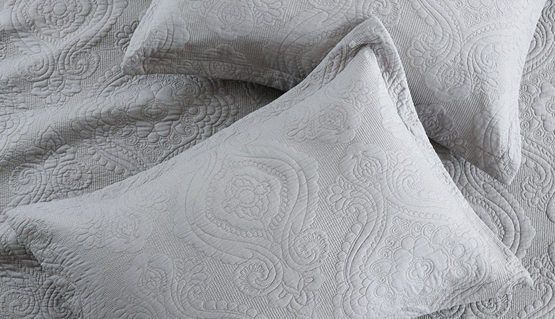 Quilted cotton pillow shams in dove grey