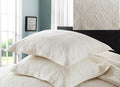 Quilted cotton pillow shams in ivory